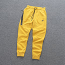 Conjunto Tech Fleece Nike - Amarelo